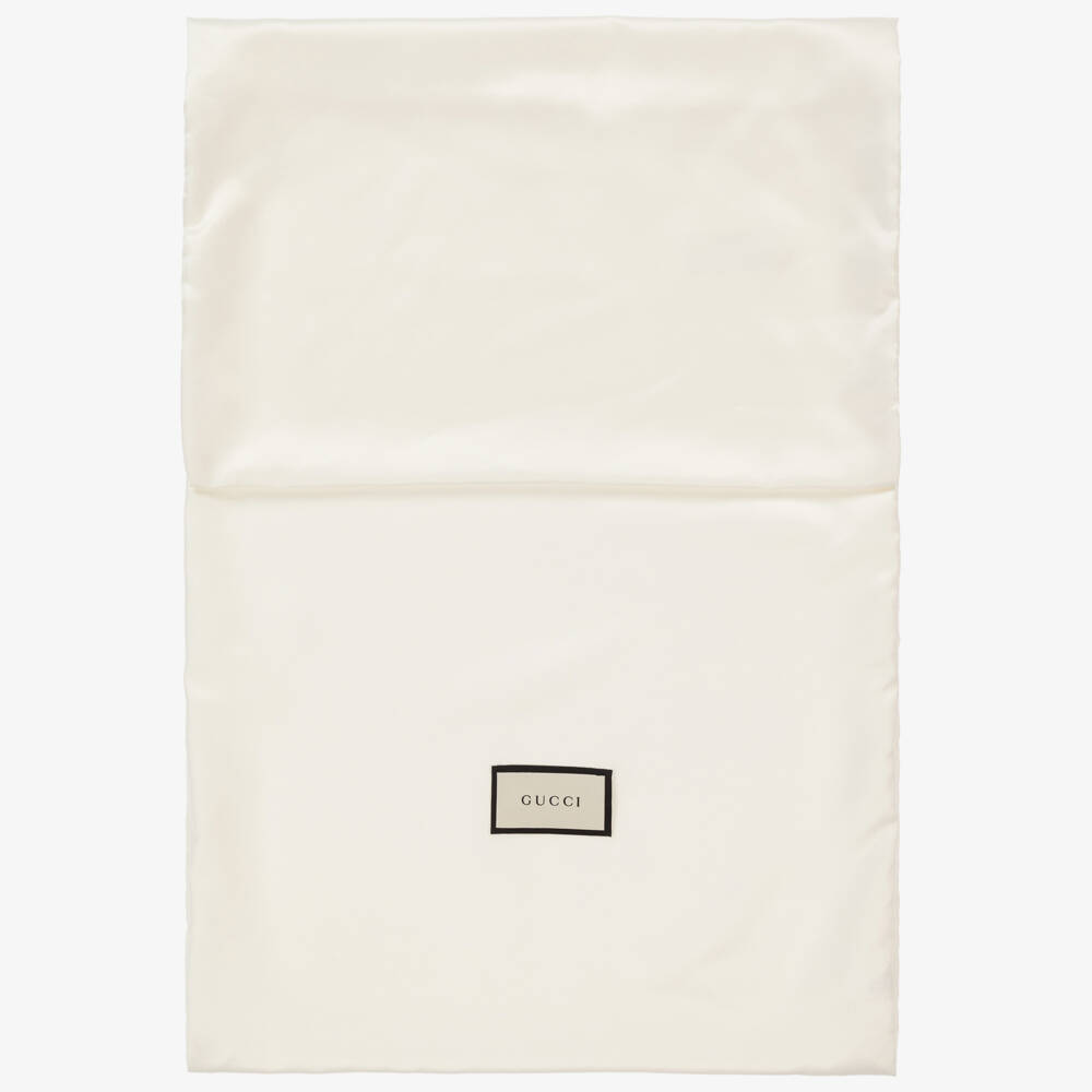 Gucci-حذاء رياضي بشعار GG جلد لون عاجي للبنات | Childrensalon