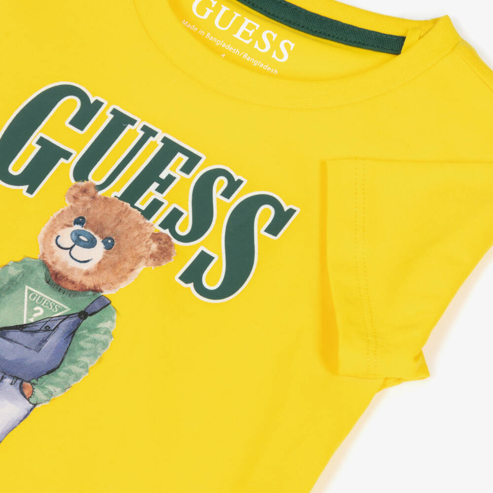Guess-تيشيرت قطن بطبعة شعار ودب لون أصفر للأولاد | Childrensalon