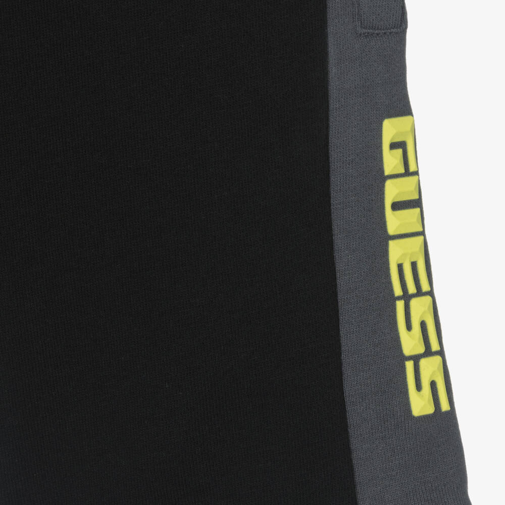 Guess-Boys Black Cotton Jersey Shorts with Yellow Logo Print | Childrensalon