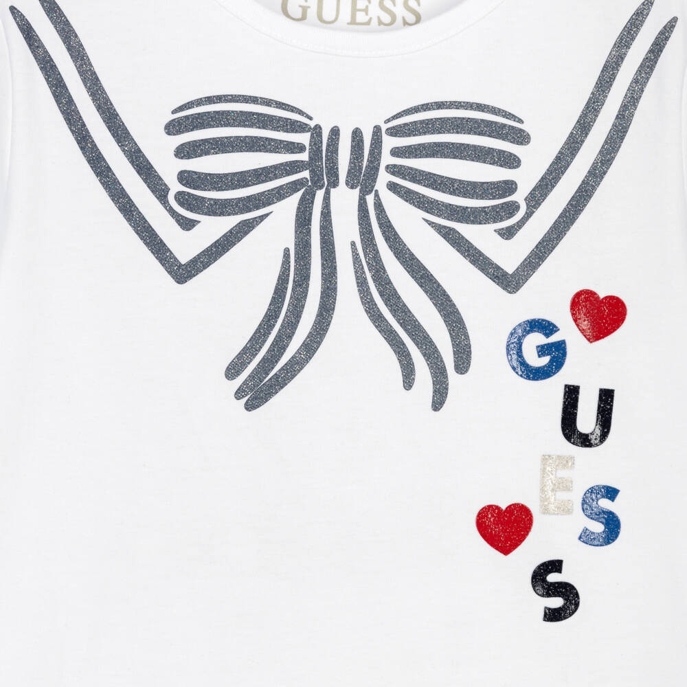 Guess-Girls White Cotton Jersey T-Shirt with Glittery Bow & Logo | Childrensalon