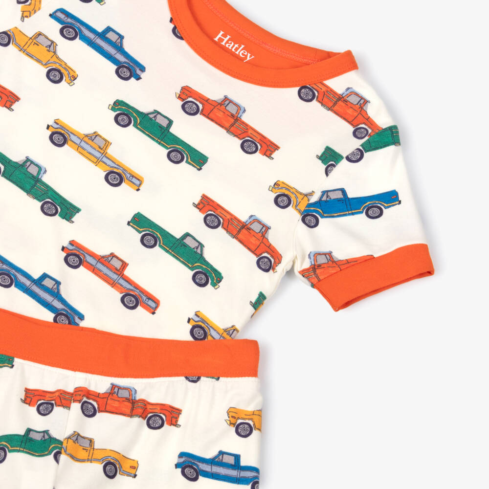 Hatley-Boys Ivory & Orange Bamboo Jersey Trucks Short Pyjamas | Childrensalon