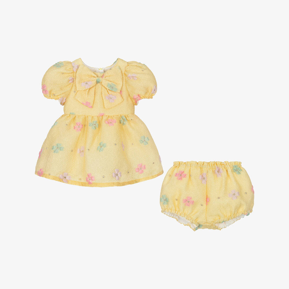 Hucklebones London-Платье жёлтое жаккардовое с цветами и бантом для малышек | Childrensalon