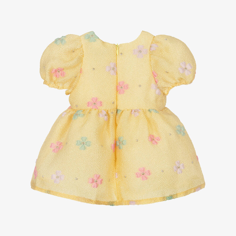 Hucklebones London-Платье жёлтое жаккардовое с цветами и бантом для малышек | Childrensalon