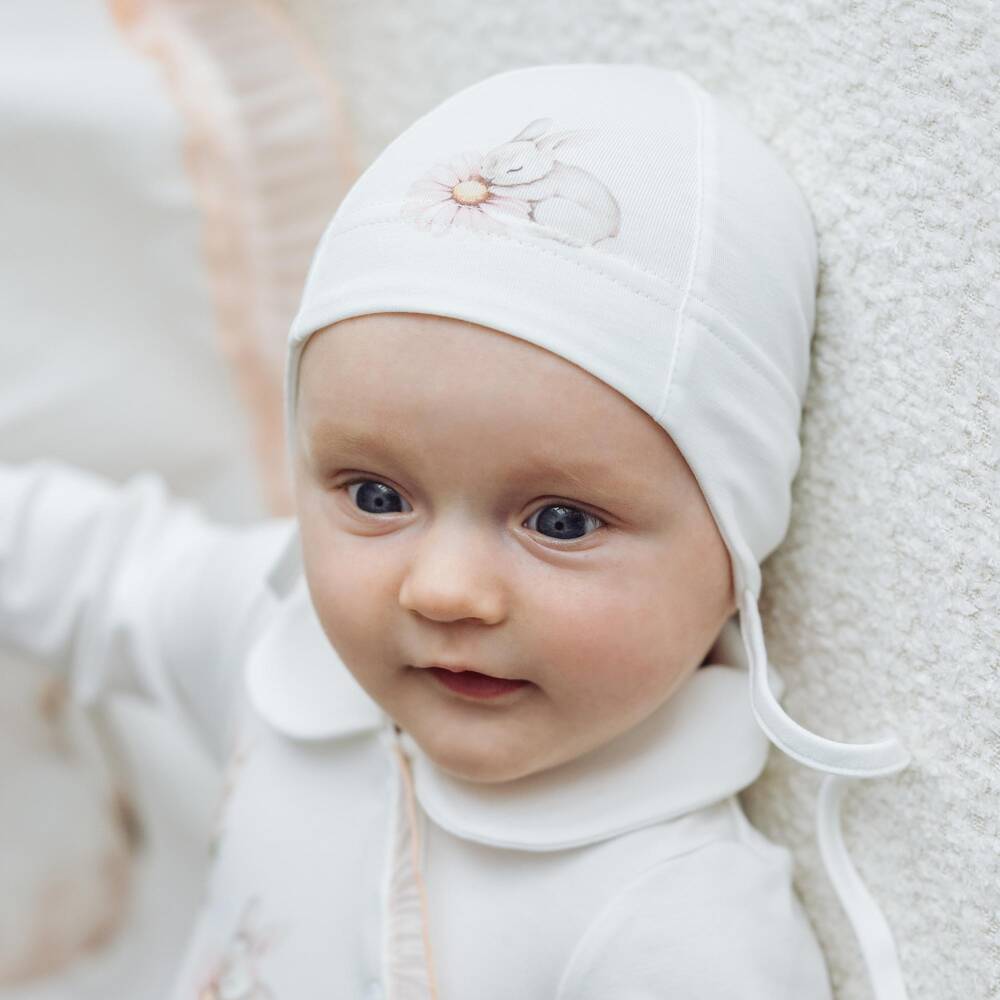 Jamiks-Baby Girls Ivory Cotton Jersey Hat with Floral Bunny Print | Childrensalon