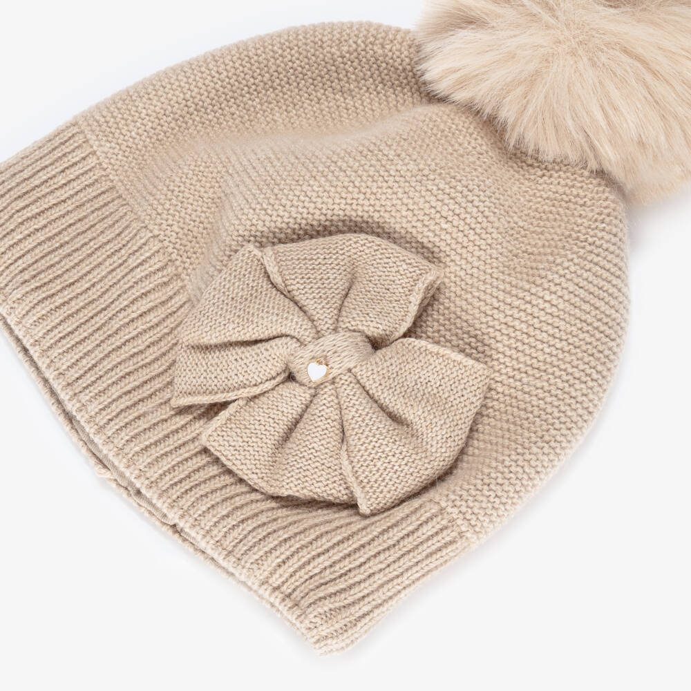 Jamiks-Girls Beige Knitted Hat with Bow & Pom-Pom  | Childrensalon