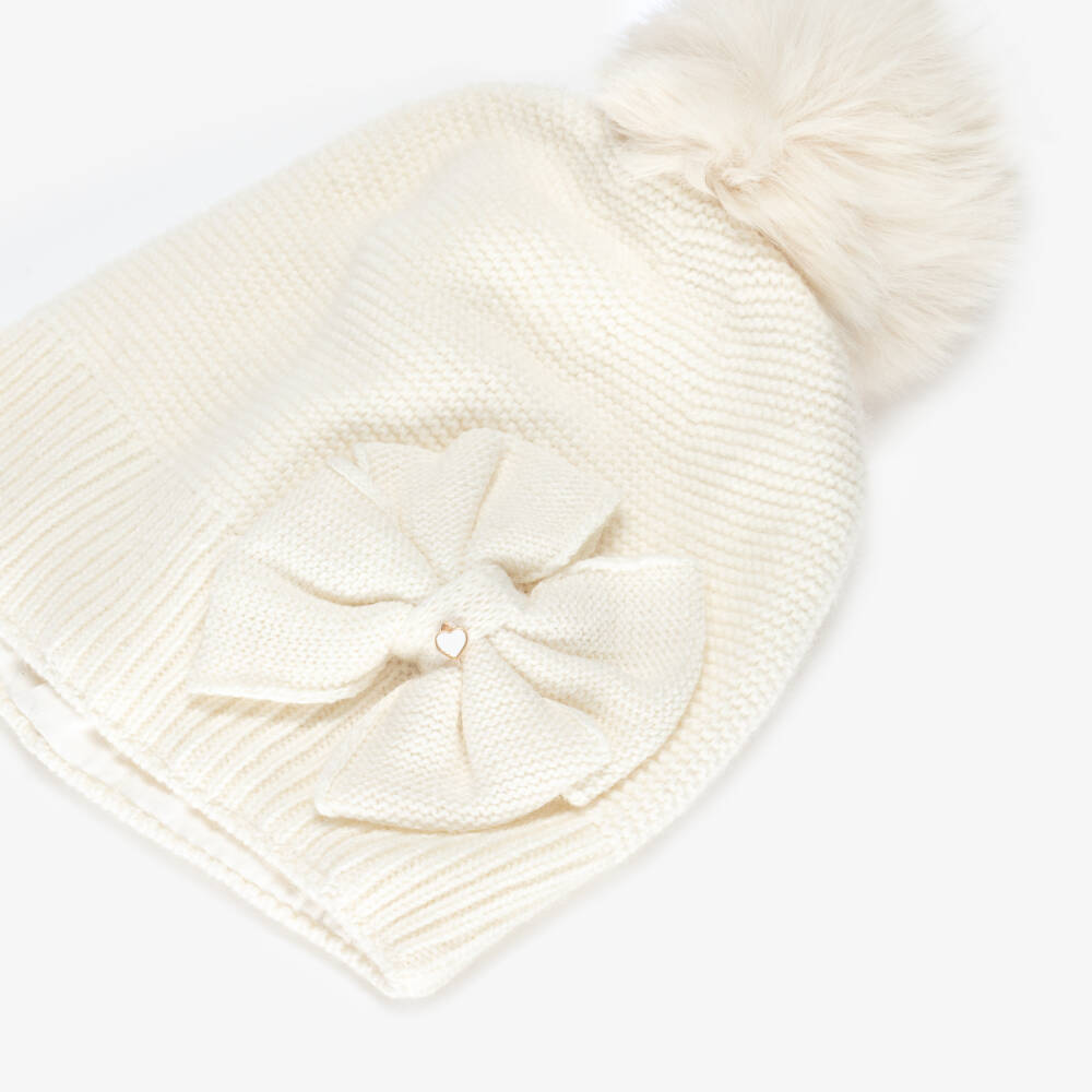 Jamiks-Girls Ivory Knitted Hat with Bow & Pom-Pom | Childrensalon