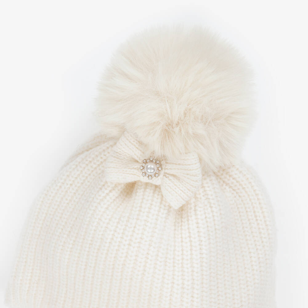 Jamiks-قبعة بوم بوم محبوكة ومزينة بفيونكة لون عاجي للبنات | Childrensalon