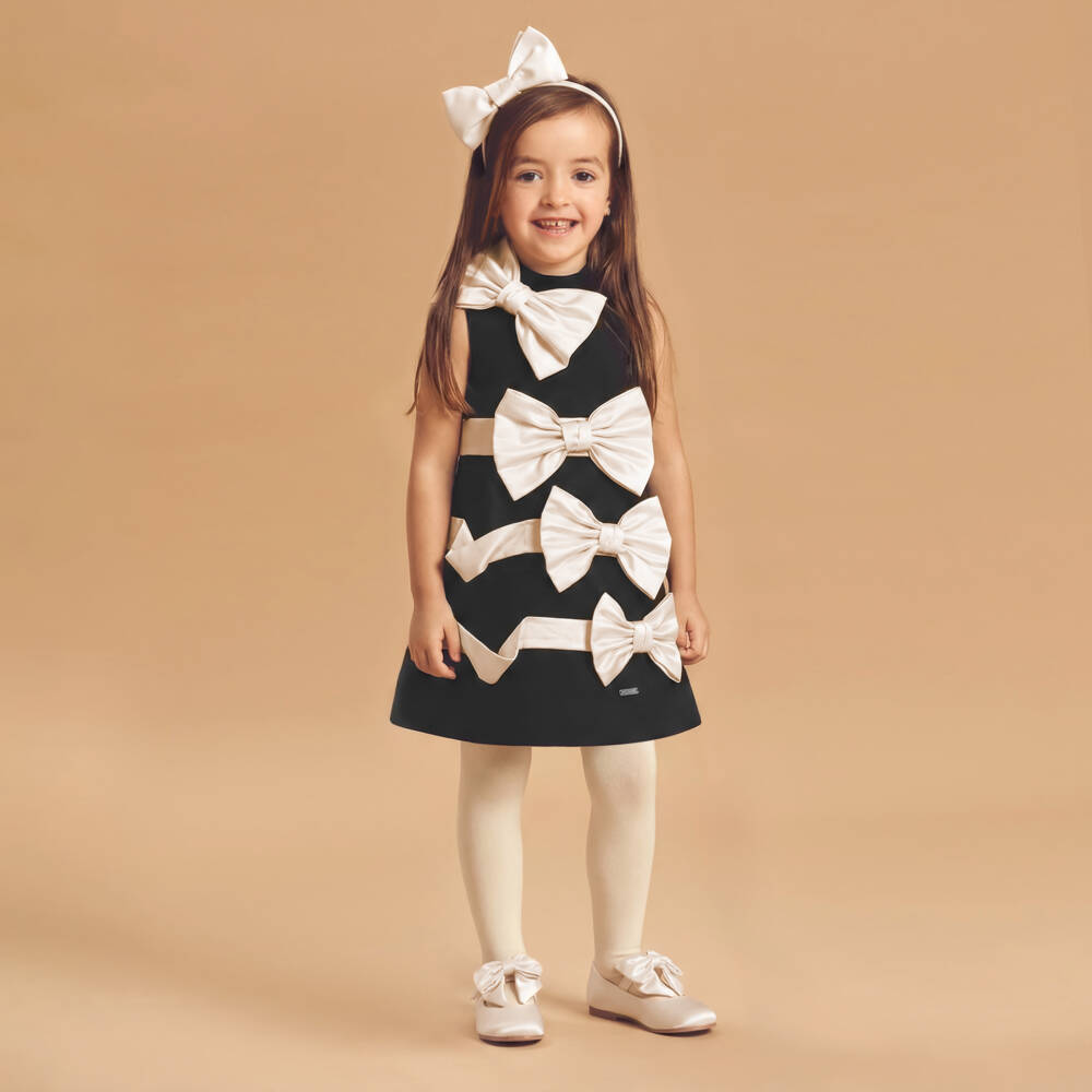 Jessie and James London-Girls Black Dress with Ivory Satin Bows | Childrensalon