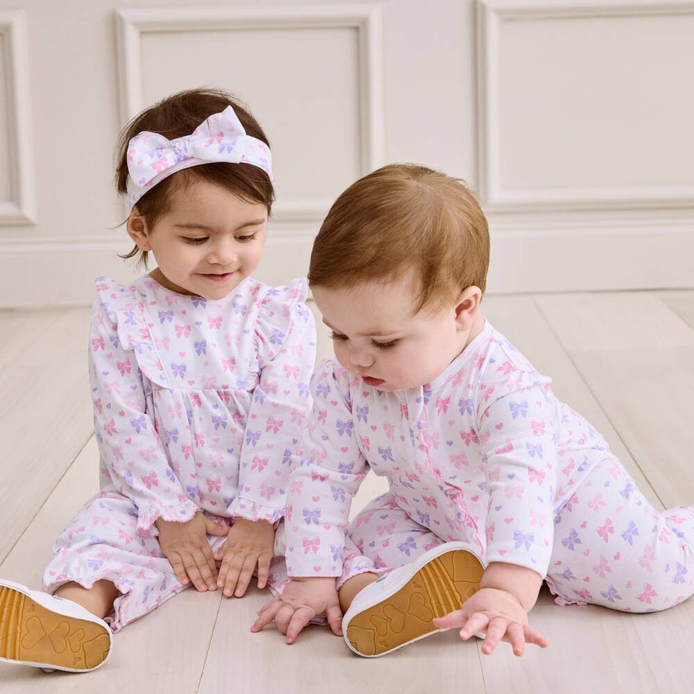 Kissy Kissy-Baby Girls Pink Billowy Bows Pima Cotton Babygrow | Childrensalon