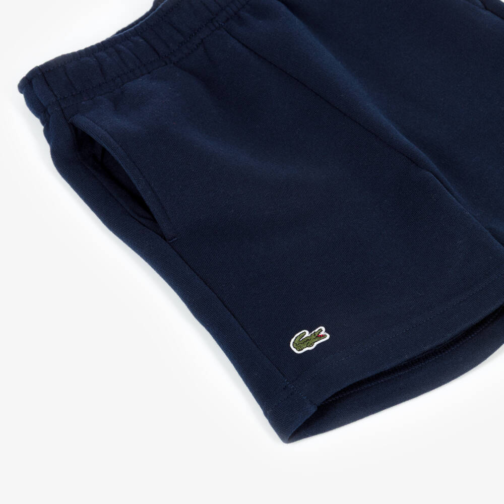 Lacoste-Шорты синие из хлопкового трикотажа с крокодилом для мальчиков | Childrensalon