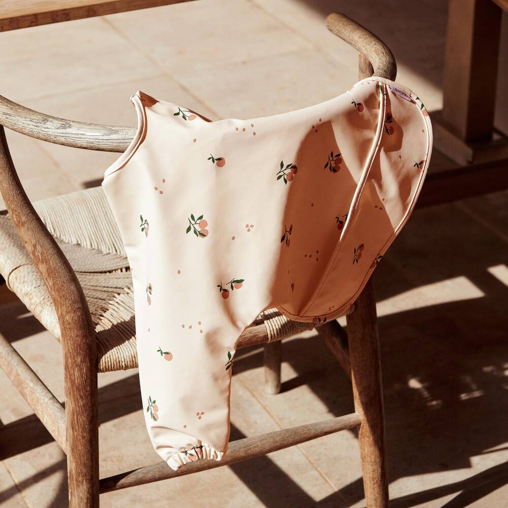 Liewood-Girls Pink Printed Apron Bib | Childrensalon