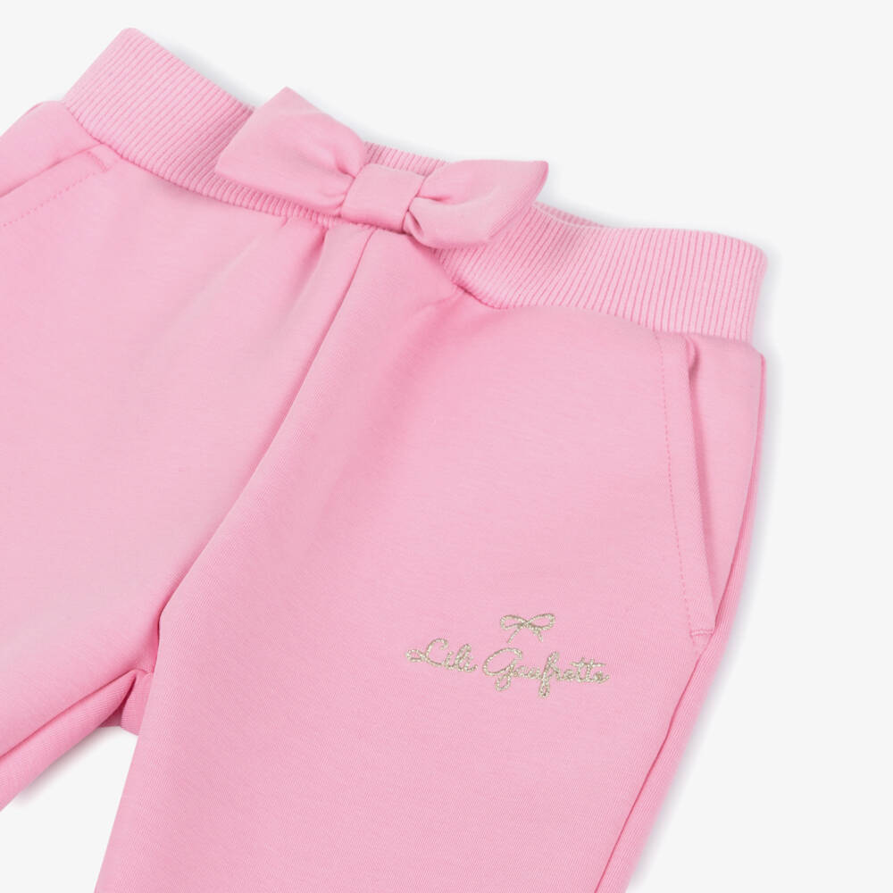 Lili Gaufrette-Girls Pink Scuba Jersey Joggers with Bow & Gold Logo | Childrensalon