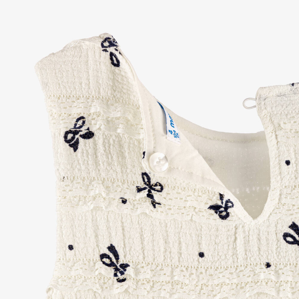 Mayoral-Girls Ivory Crinkle Jersey Dress with Bow Print | Childrensalon