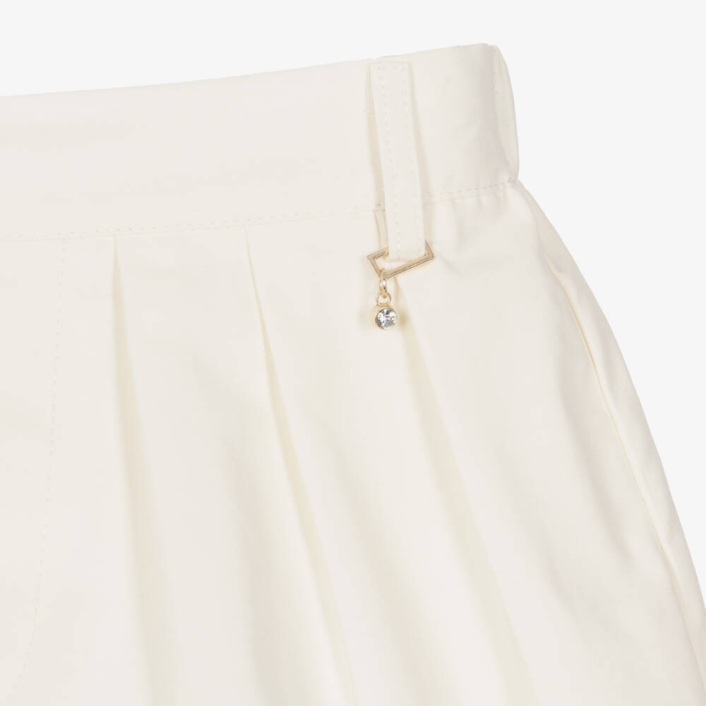 Mayoral-Girls Ivory Pleated Skirt with Shorts Lining | Childrensalon
