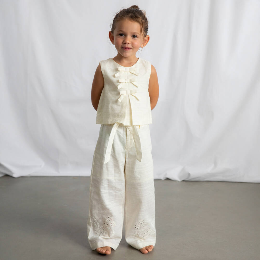 Mayoral-Кремовая блузка без рукавов с бантами для девочек | Childrensalon