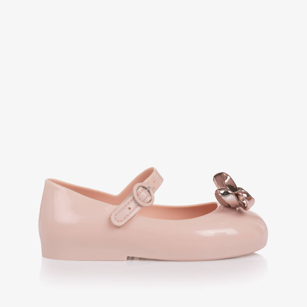 Mini Melissa-Girls Pink Jelly Pumps with Rose Gold Bow | Childrensalon