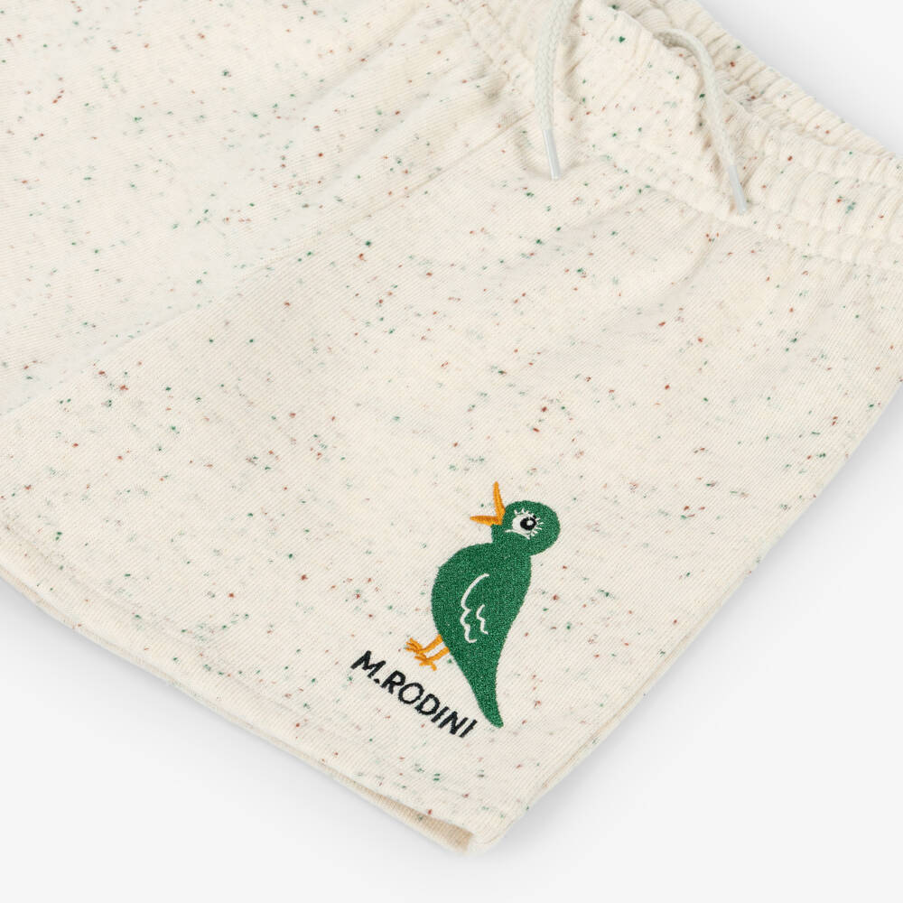 Mini Rodini-Beige Organic Cotton Shorts with Embroidered Green Bird | Childrensalon