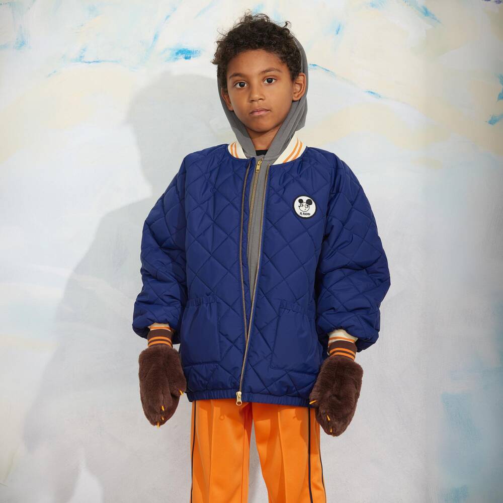 Mini Rodini-Boys Blue Quilted Puffer Jacket with Ritzratz Patch | Childrensalon
