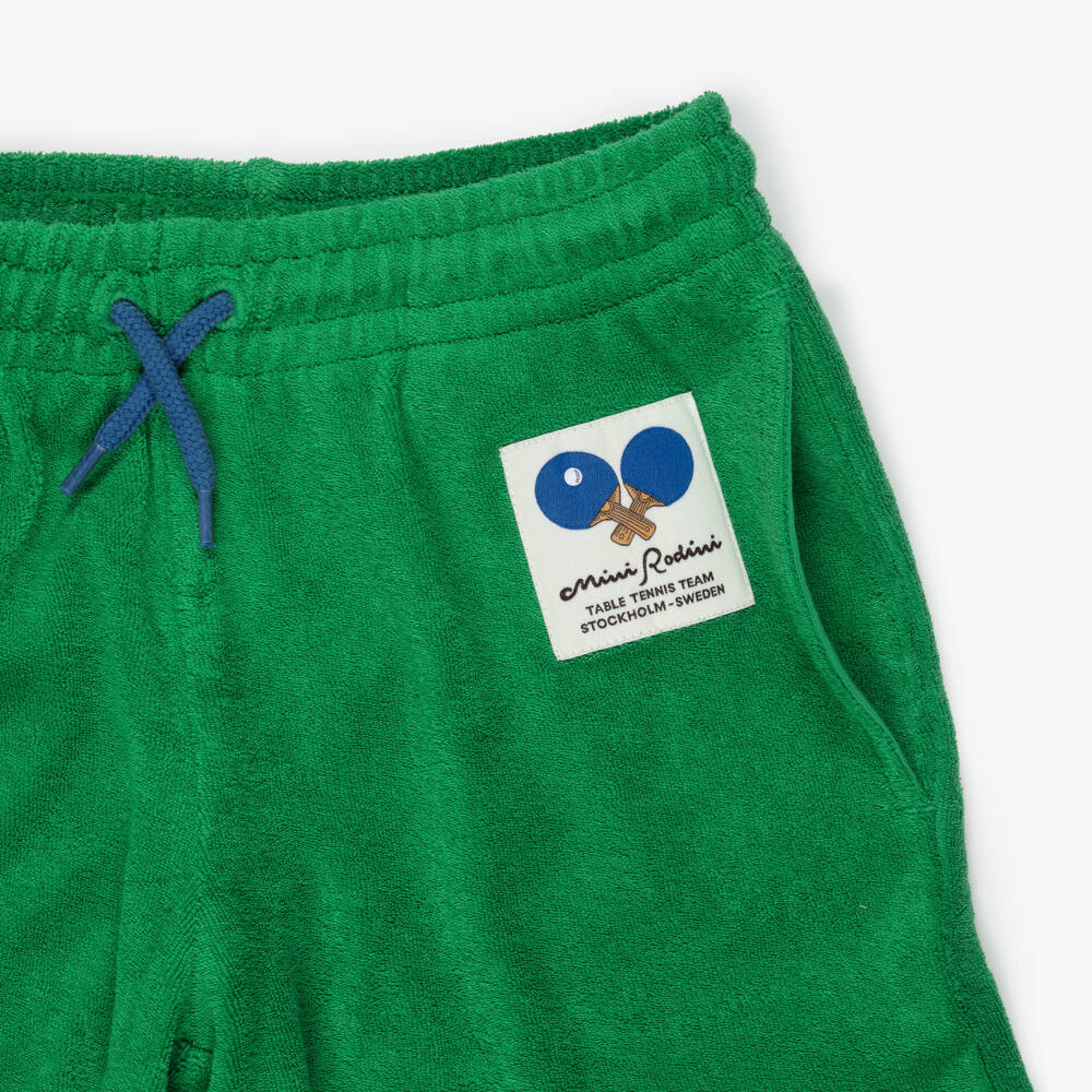 Mini Rodini-Boys Green Terry Towelling Shorts with Table Tennis Motif | Childrensalon