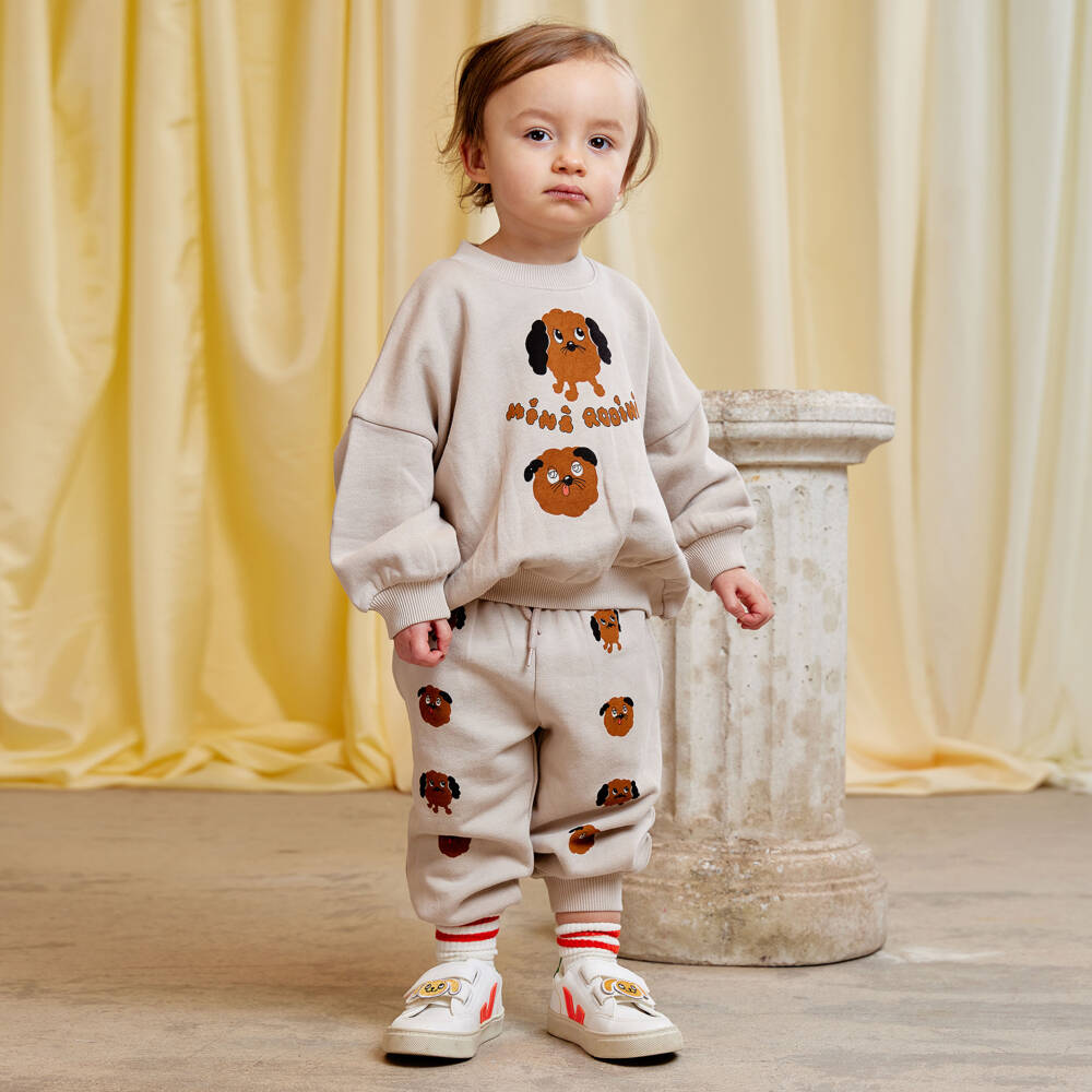 Mini Rodini-سويتشيرت قطن عضوي بطبعة كلب لون بيج فاتح | Childrensalon