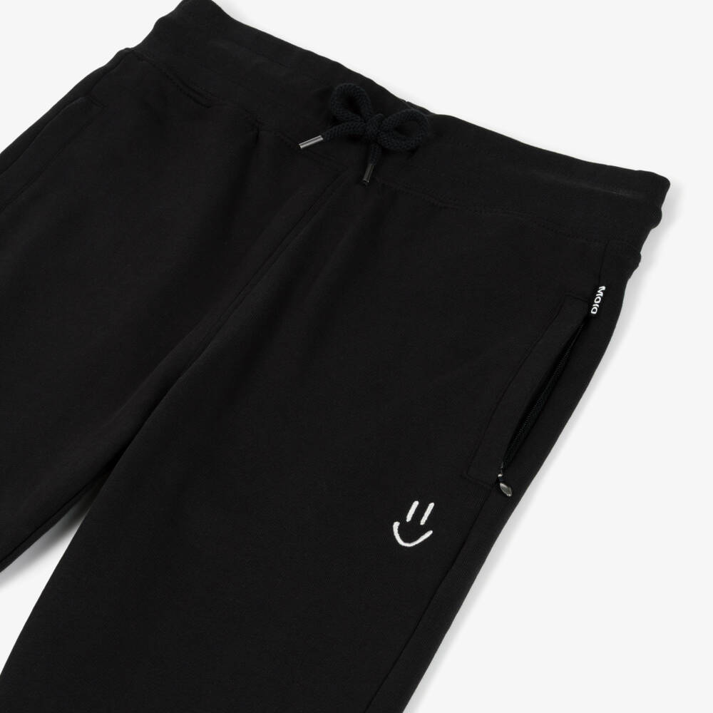 Molo-بنطلون رياضي بجيوب بسحاب قطن عضوي لون أسود | Childrensalon