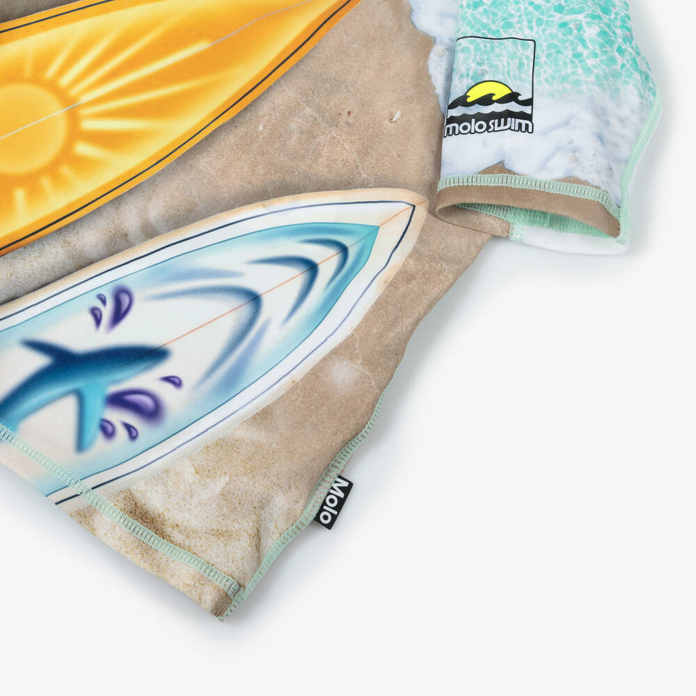 Molo-توب سباحة بطبعة ألواح تزلج لون بيج للأولاد (UPF50+) | Childrensalon