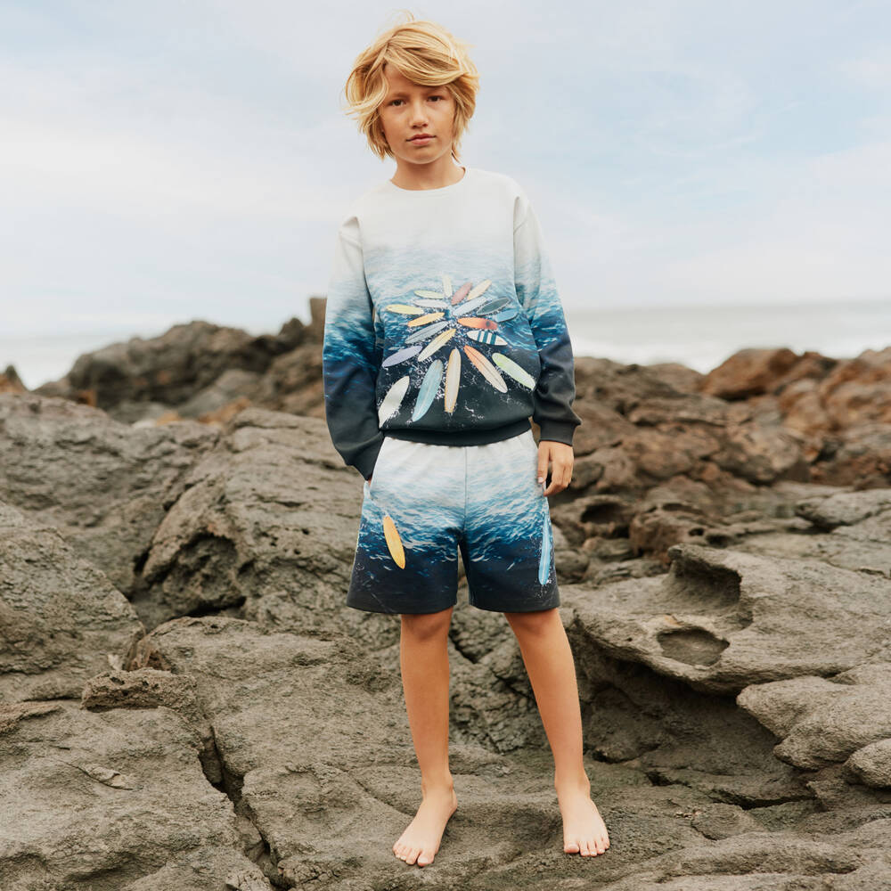 Molo-Boys Ivory & Blue Cotton Jersey Surfboard Shorts | Childrensalon