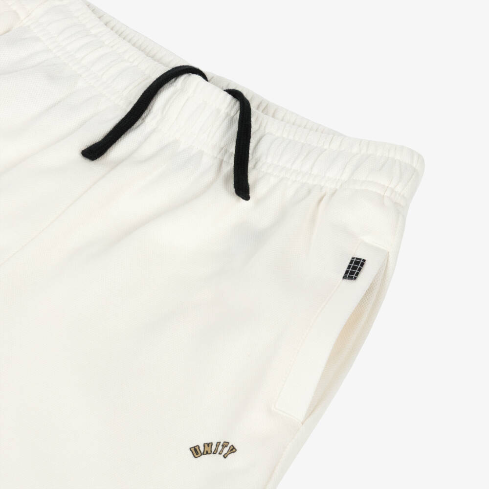 Molo-Шорты белые из органического хлопка с черными полосками для мальчиков | Childrensalon