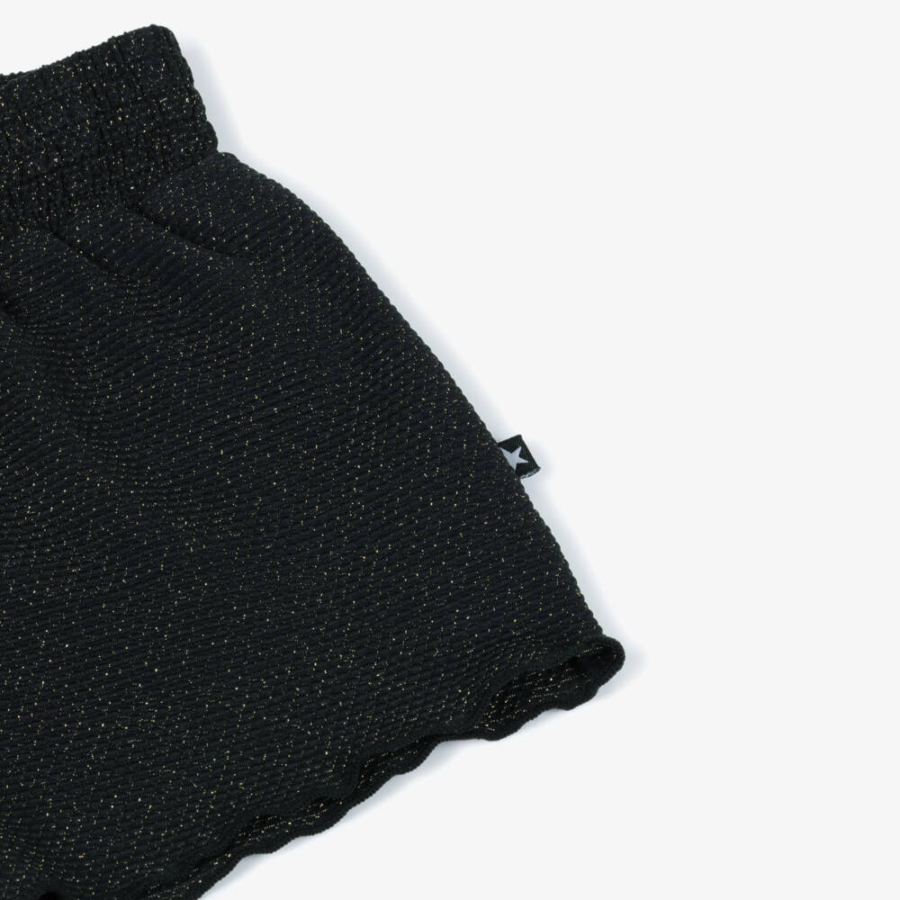 Molo-Girls Black Glitter Swim Shorts (UPF50+) | Childrensalon