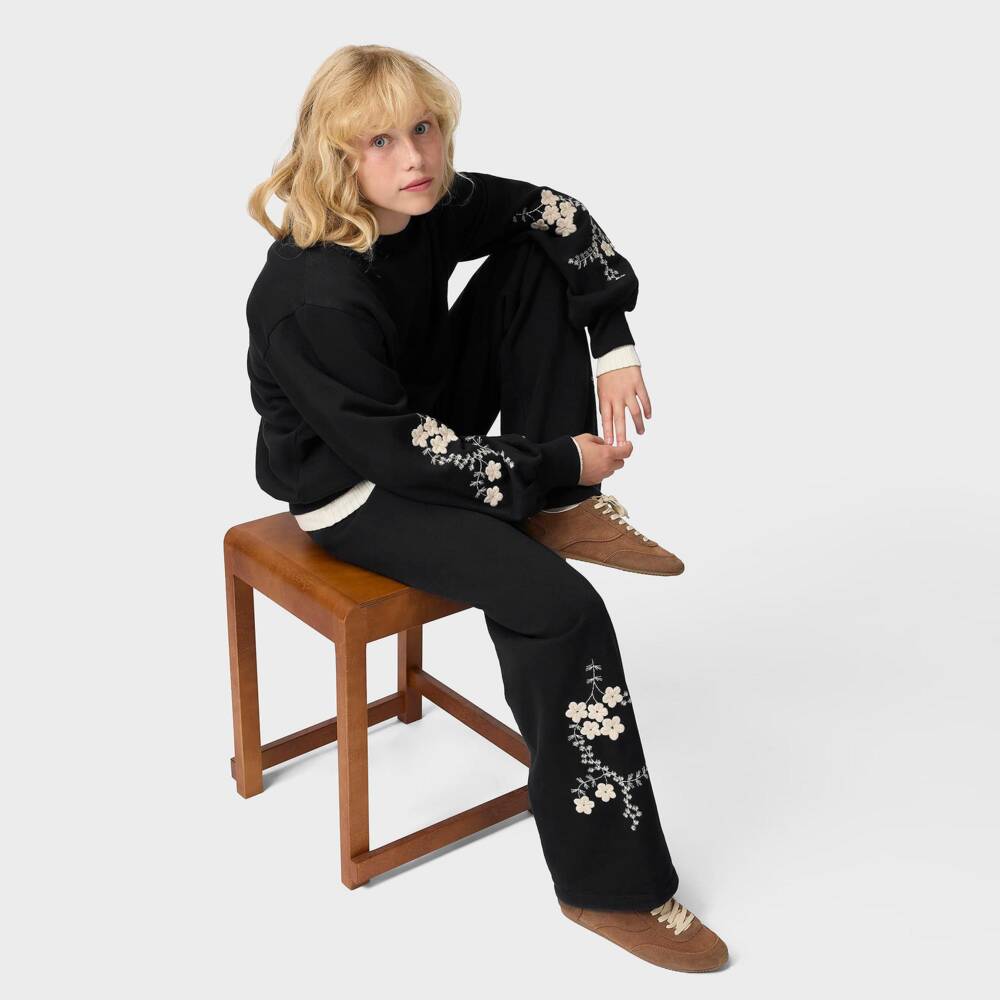 Molo-Girls Black Joggers with Embroidered Ivory Flowers | Childrensalon
