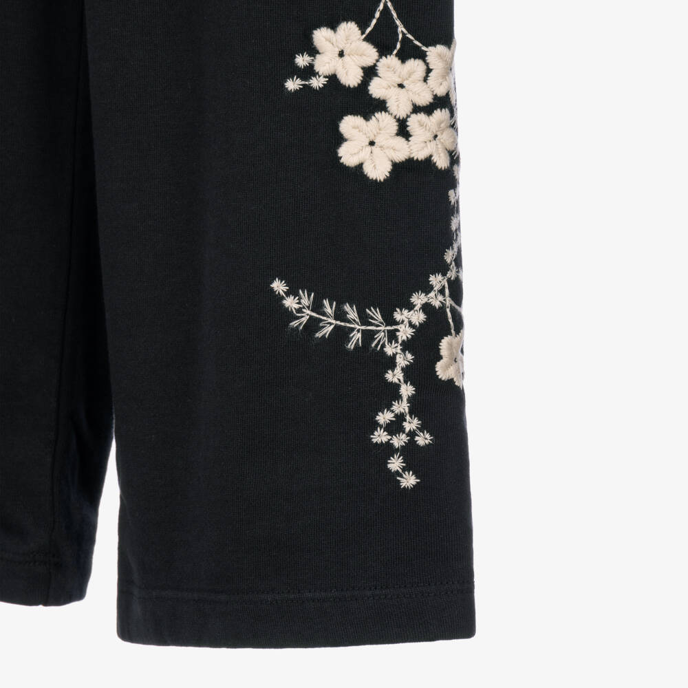 Molo-Girls Black Joggers with Embroidered Ivory Flowers | Childrensalon