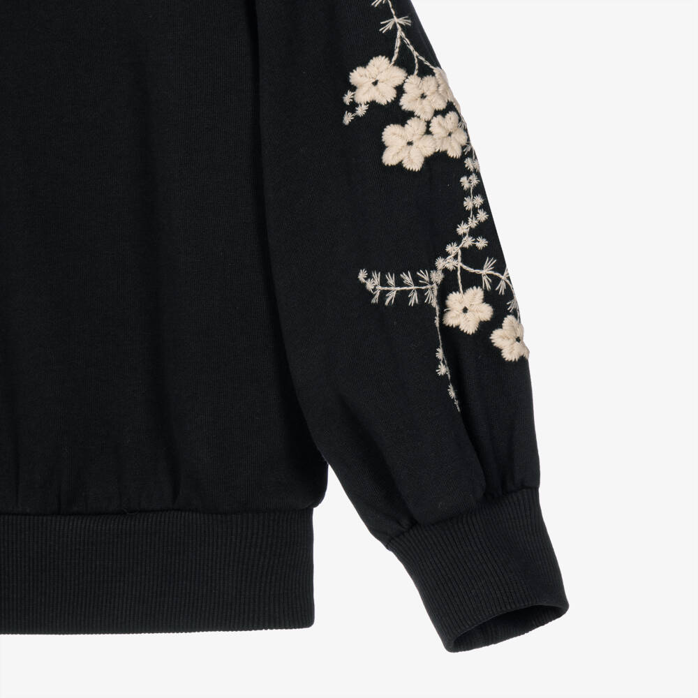 Molo-Girls Black Sweatshirt with Embroidered Ivory Flowers | Childrensalon