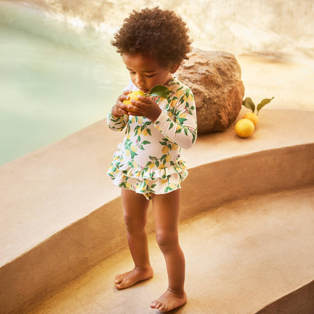 Molo-Girls Ivory & Yellow Lemon Long Sleeve Swimsuit (UPF50+) | Childrensalon