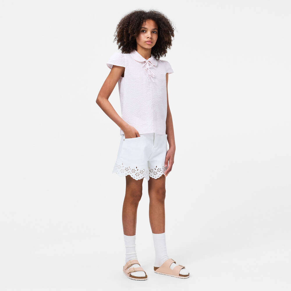 Molo-Girls White Cotton Denim Shorts with Broderie Trim | Childrensalon