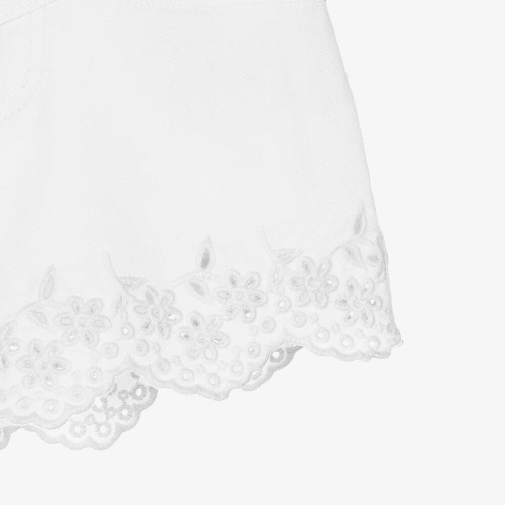 Molo-Girls White Cotton Denim Shorts with Broderie Trim | Childrensalon