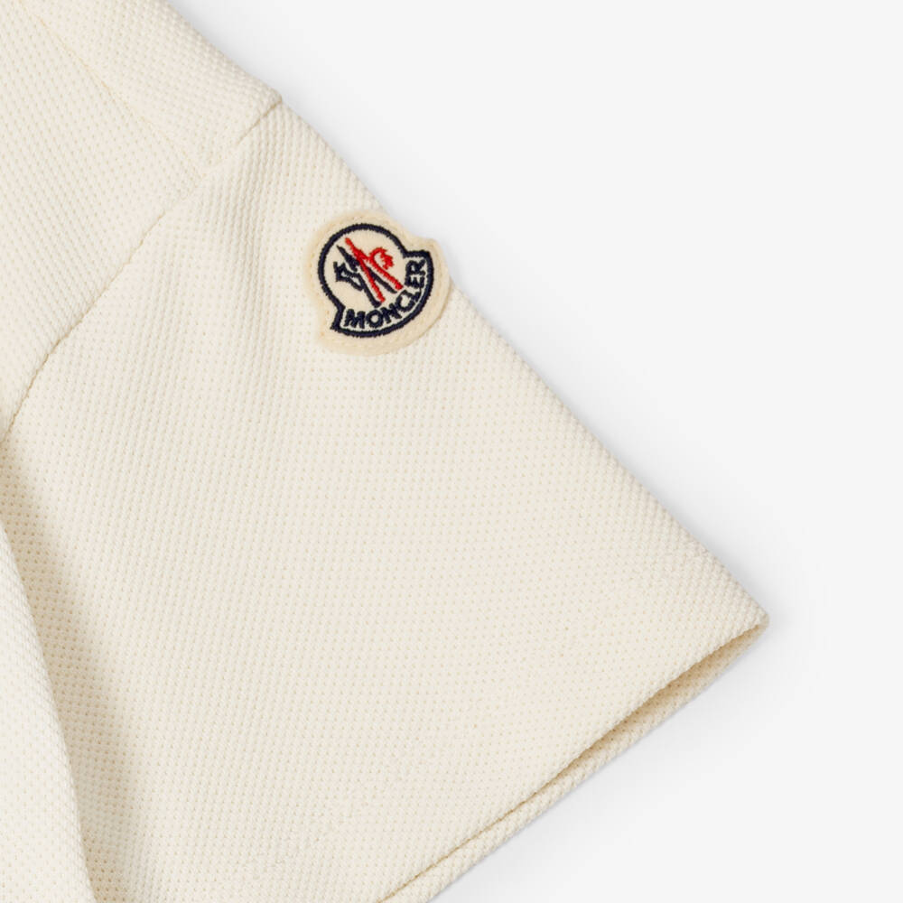 Moncler Enfant-Girls Ivory Piqué Jersey Pleated Polo Dress | Childrensalon