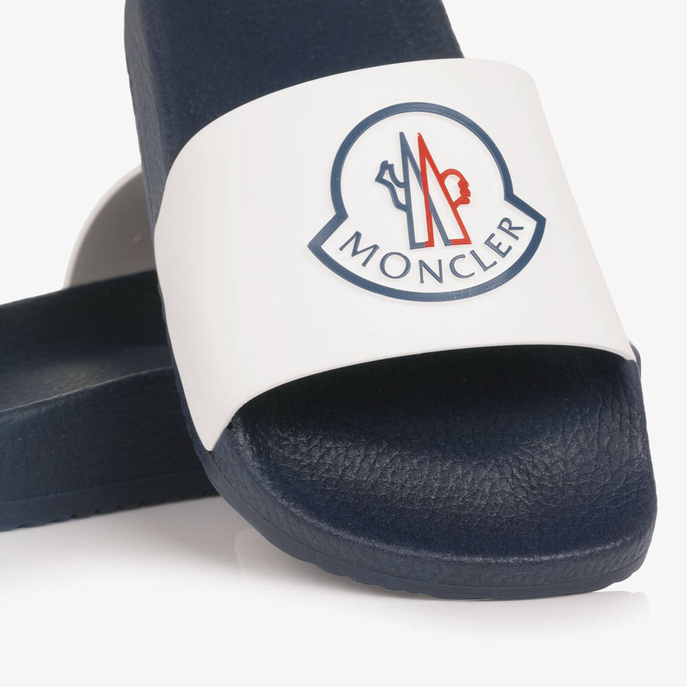 Moncler Enfant-Navy Blue & White Sliders with Bell Logo | Childrensalon