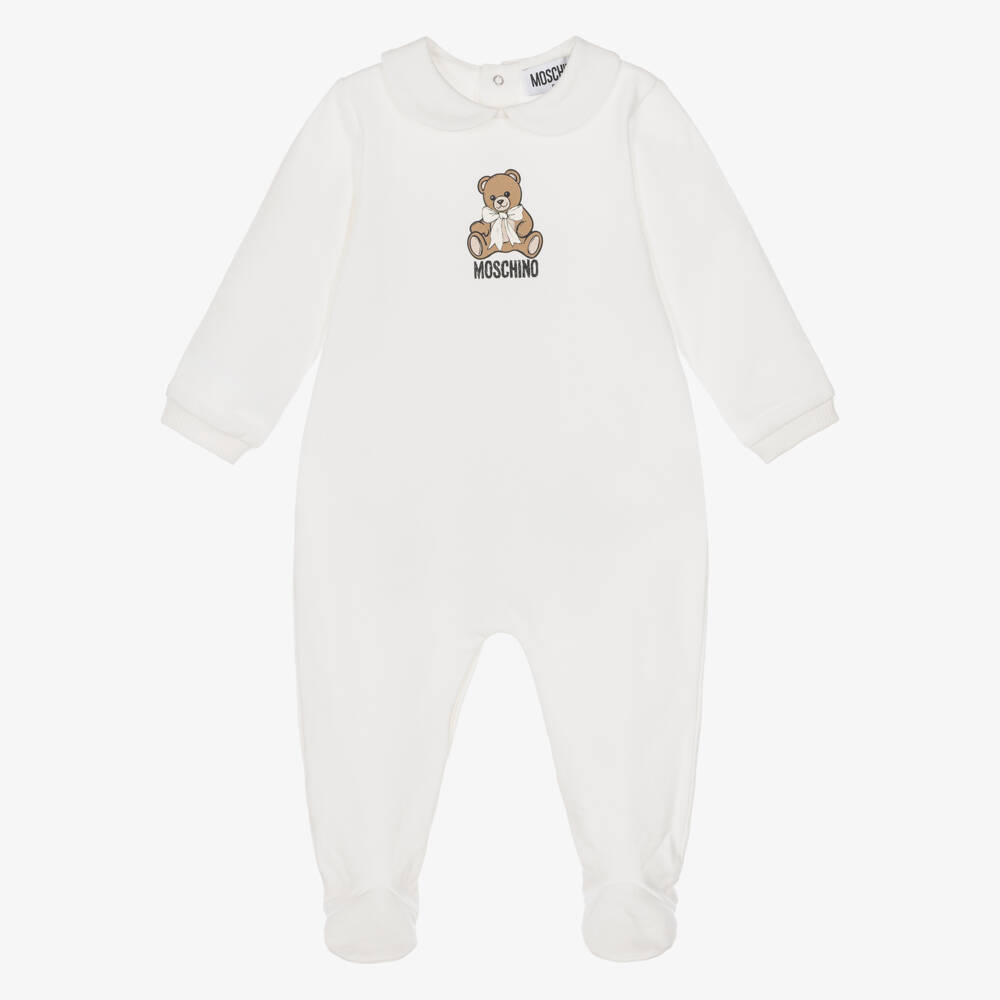 Moschino-Baby Girls Ivory Graphic Babygrow in Cotton Jersey | Childrensalon