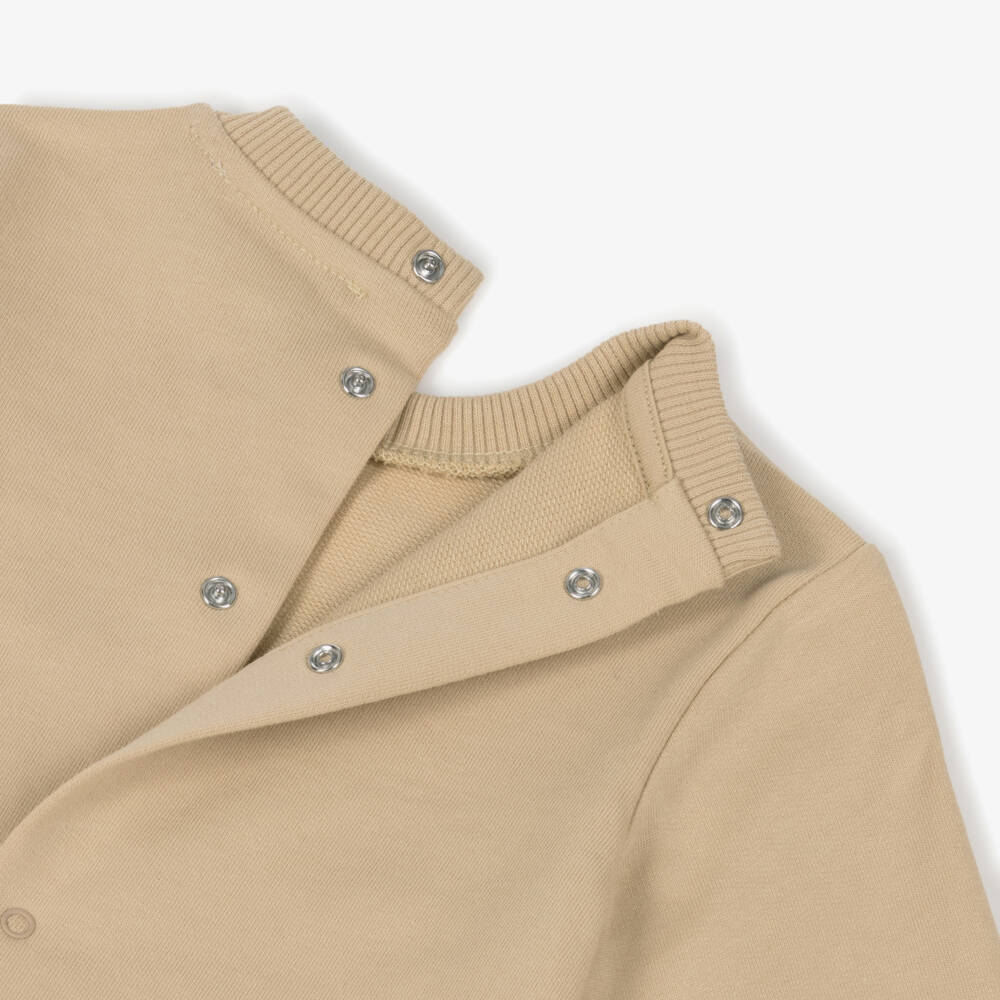 Moschino-Beige Cotton Babygrow with Teddy Bear Logo | Childrensalon