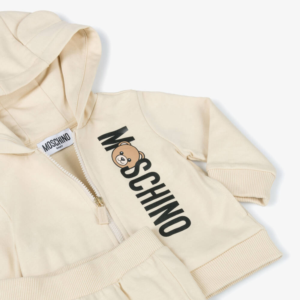 Moschino-طقم رياضي قطن لون بيج | Childrensalon