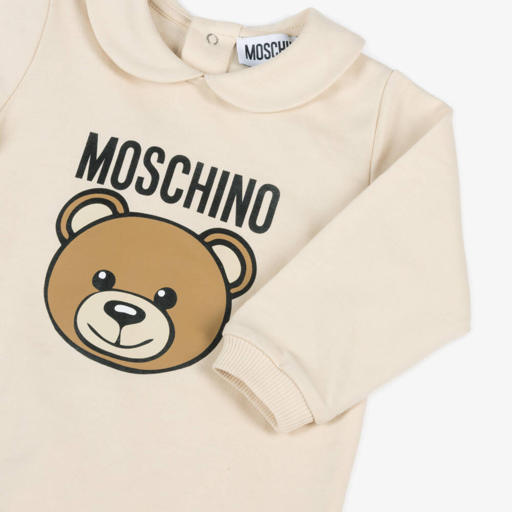 Moschino-Beige Teddy Bear Logo Babygrow | Childrensalon