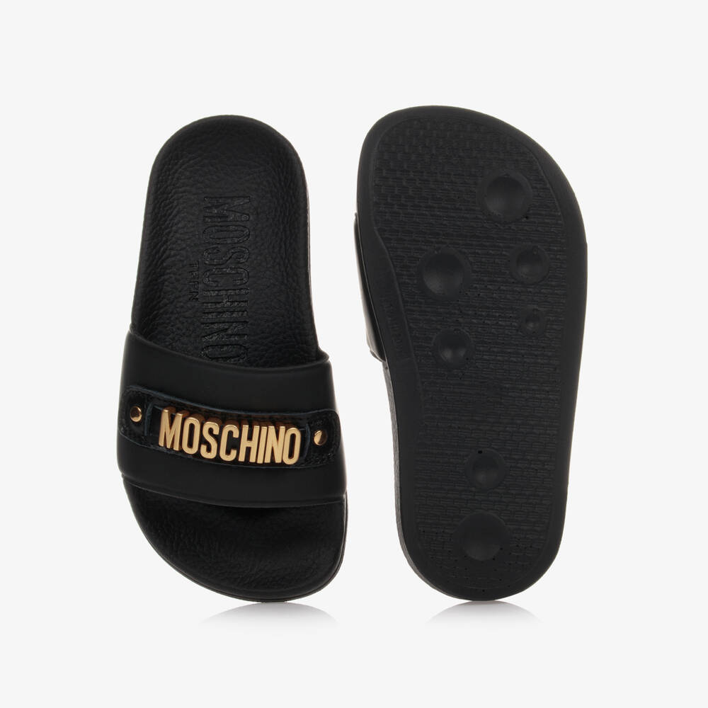 Moschino Kid-Teen-Black & Gold Metal Logo Sliders | Childrensalon