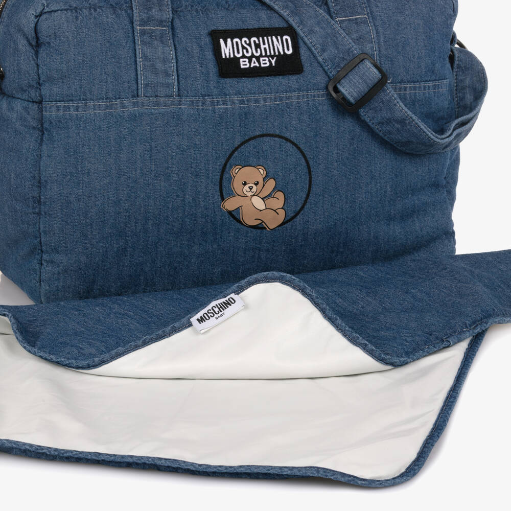 Moschino-حقيبة تغيير الحفاضات شامبراي لون أزرق بطبعة دي تيدي (37 سم) | Childrensalon