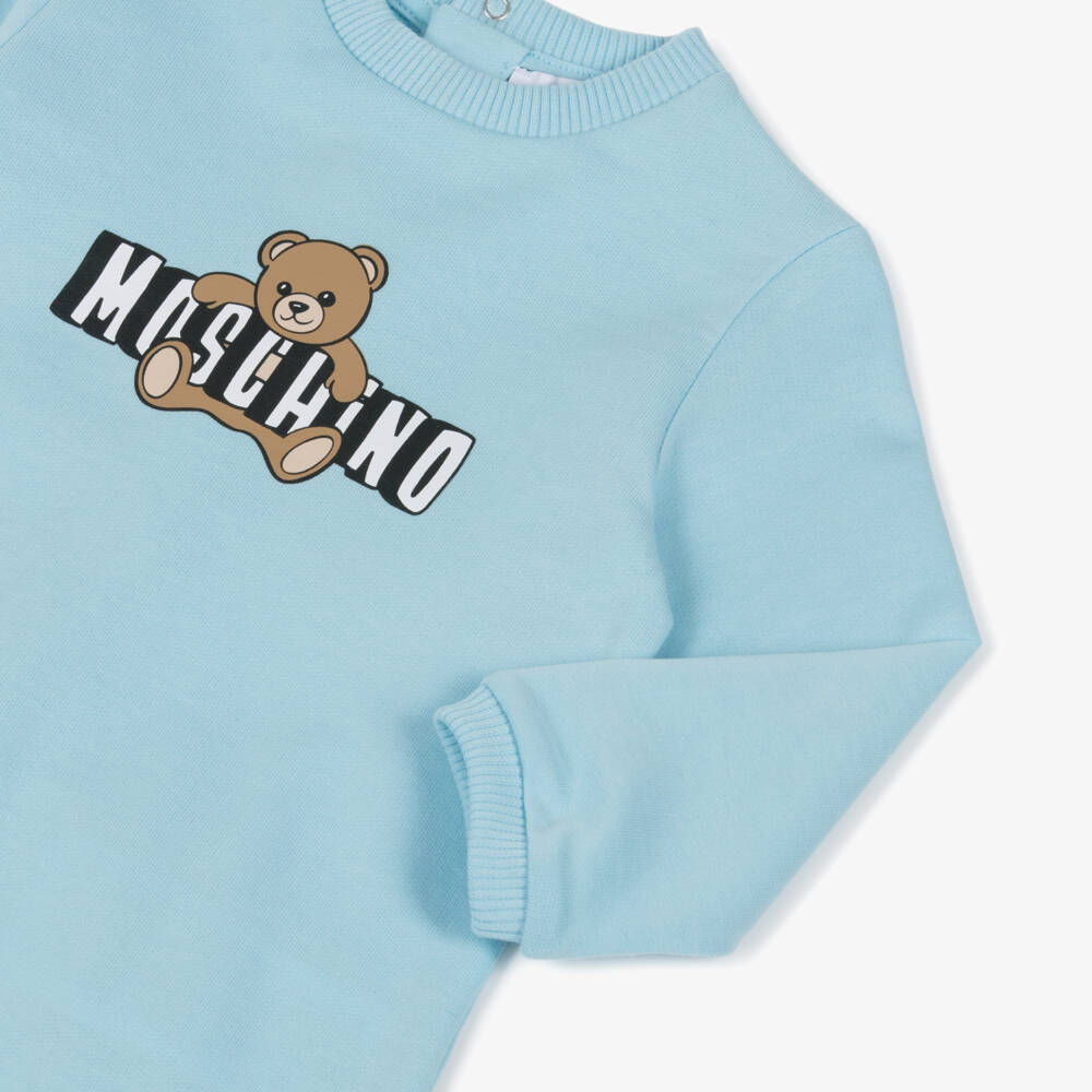 Moschino-Blue Cotton Babygrow with Teddy Bear Logo | Childrensalon