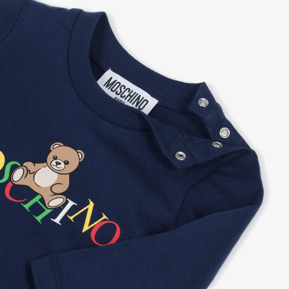 Moschino-Blue Cotton Teddy Bear Top with Colourful Logo | Childrensalon