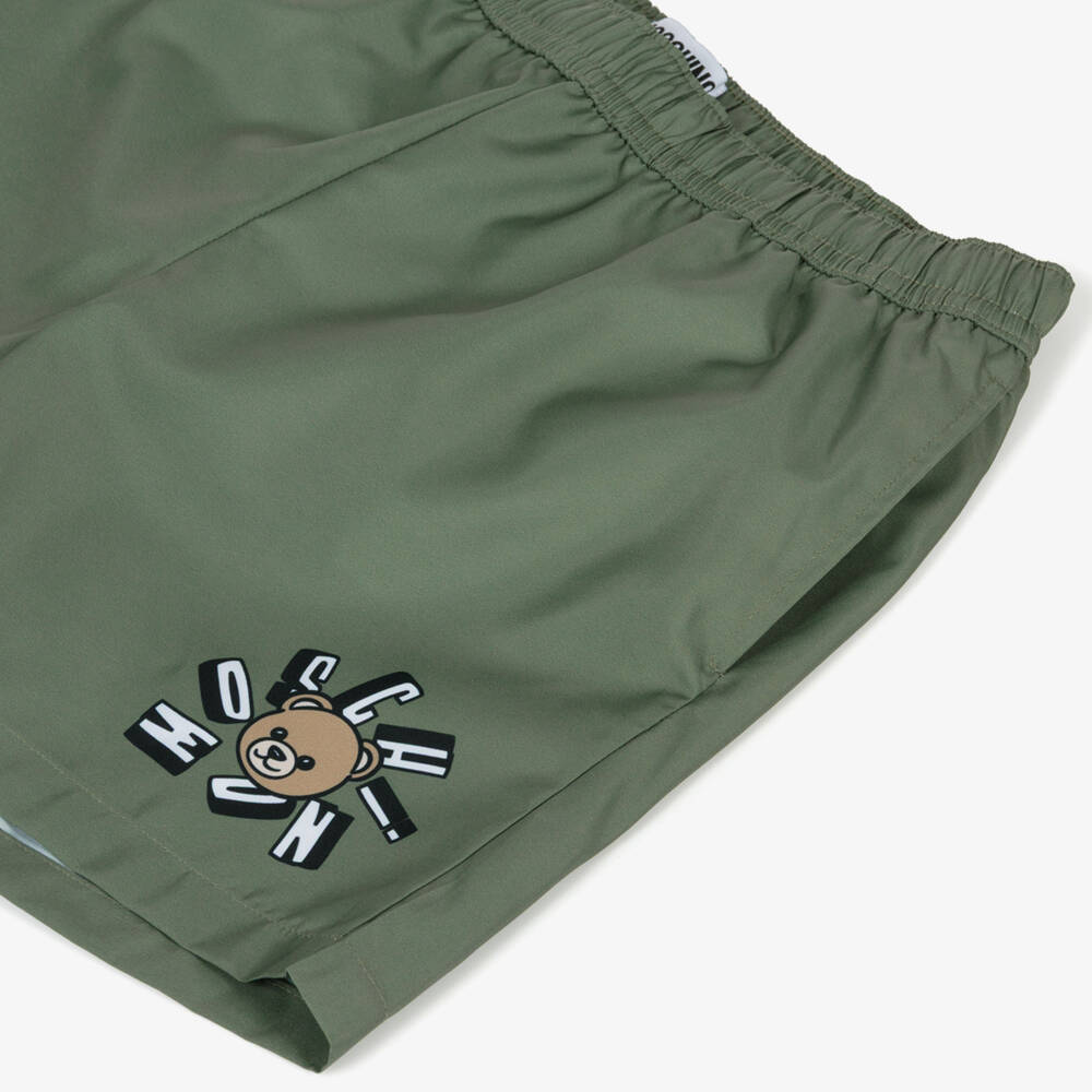 Moschino-Boys Khaki Green Swim Shorts with Teddy Bear Logo | Childrensalon