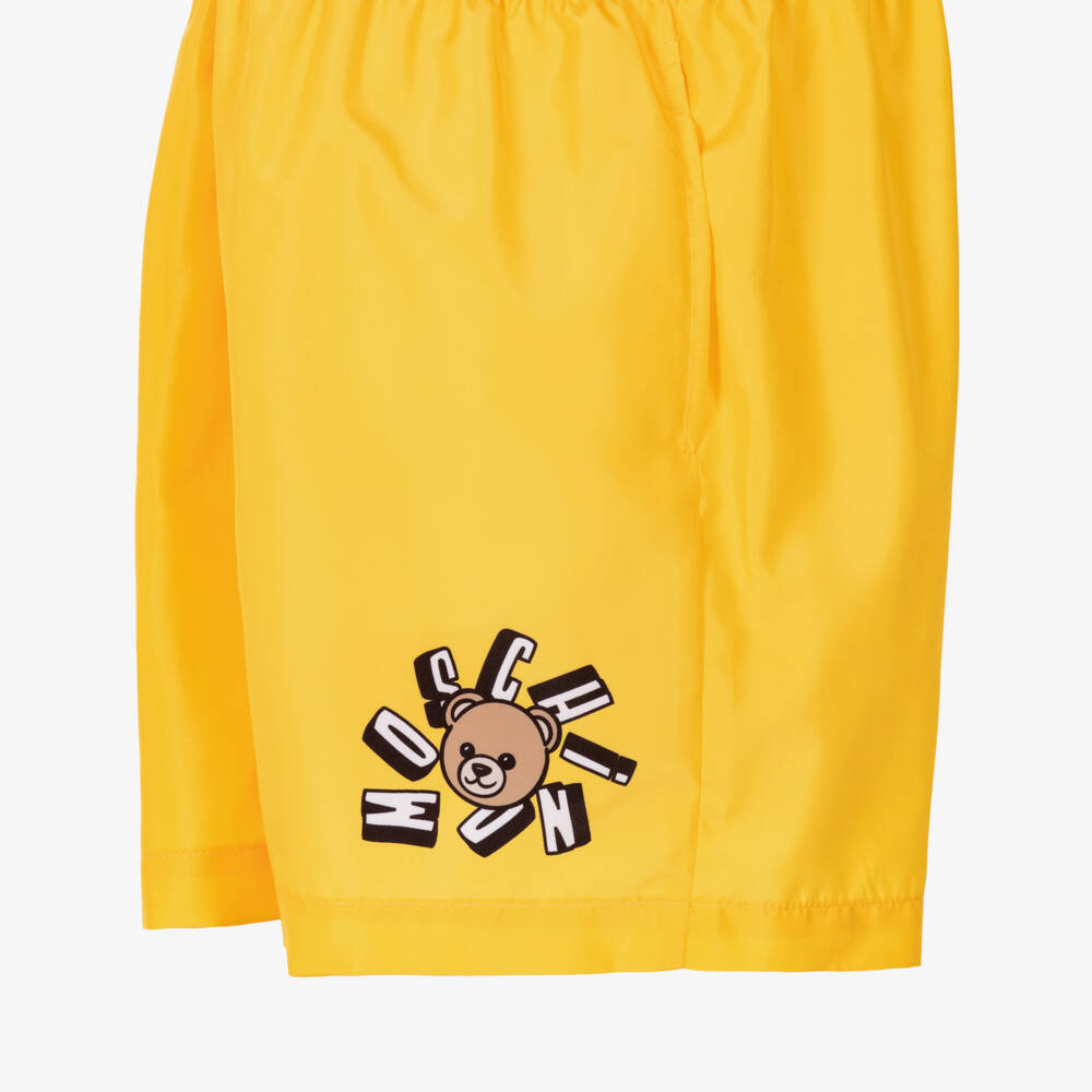 Moschino-شورت سباحة بشعار الدب تيدي لون أصفر للأولاد | Childrensalon