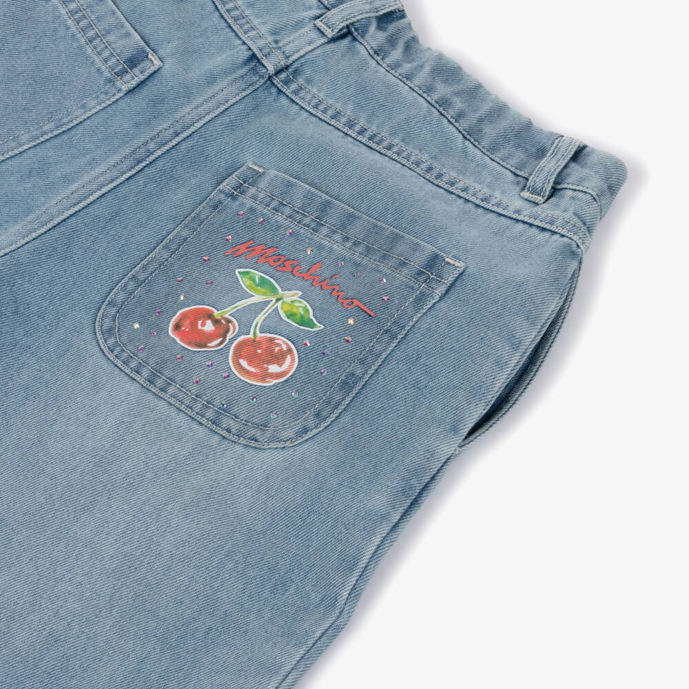 Moschino-Girls Blue Denim Barrel Leg Jeans with Cherry Print | Childrensalon