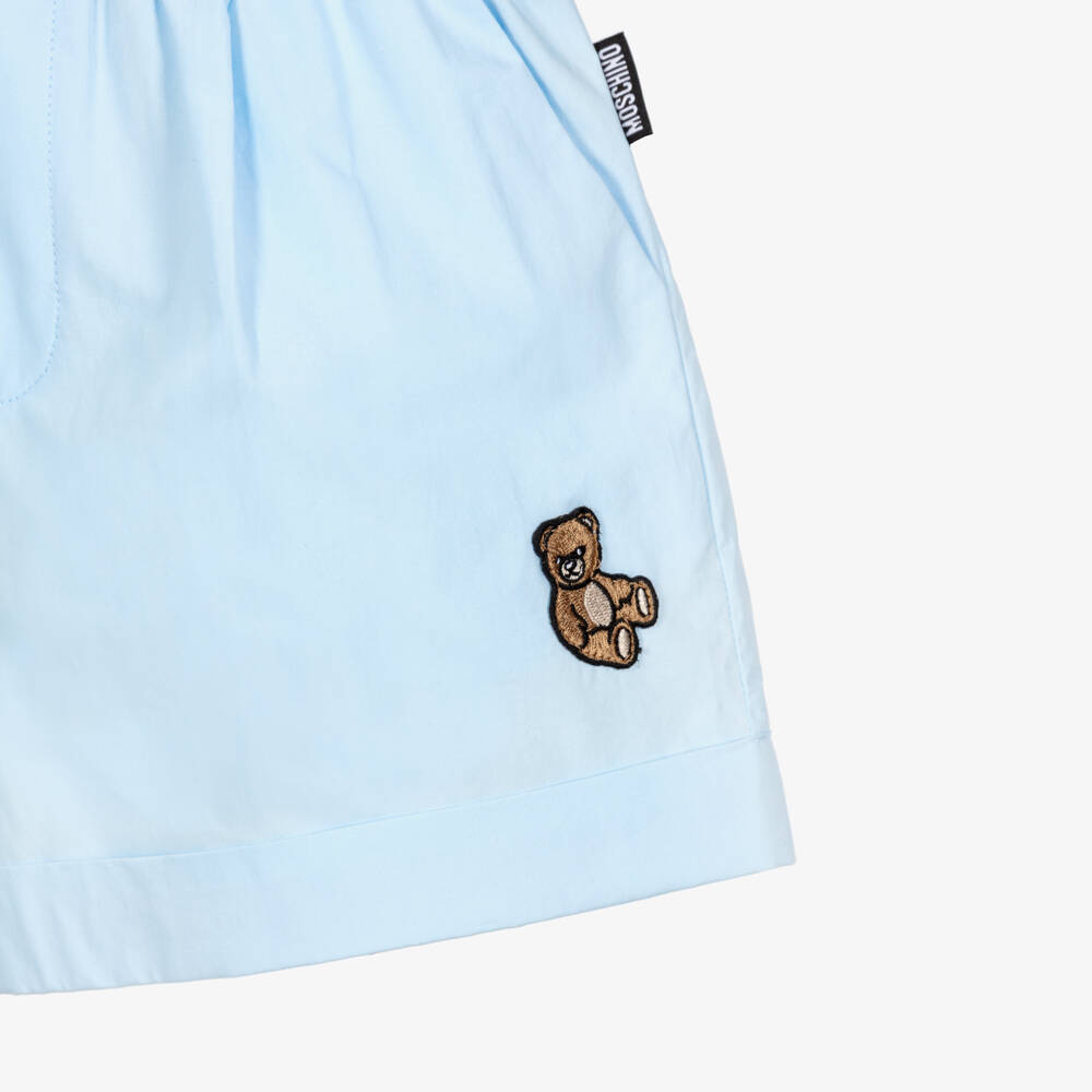 Moschino-Girls Pale Blue Poplin Shorts with Teddy Bear Patch | Childrensalon