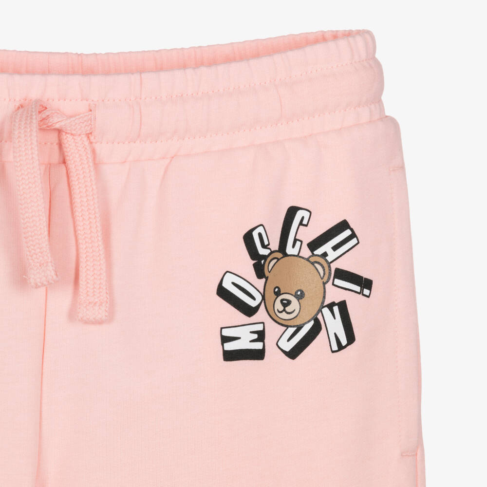 Moschino-Girls Pastel Pink Cotton Jersey Joggers with Logo Print | Childrensalon